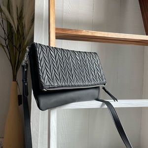 Stella & Dot black woven leather shoulder purse.